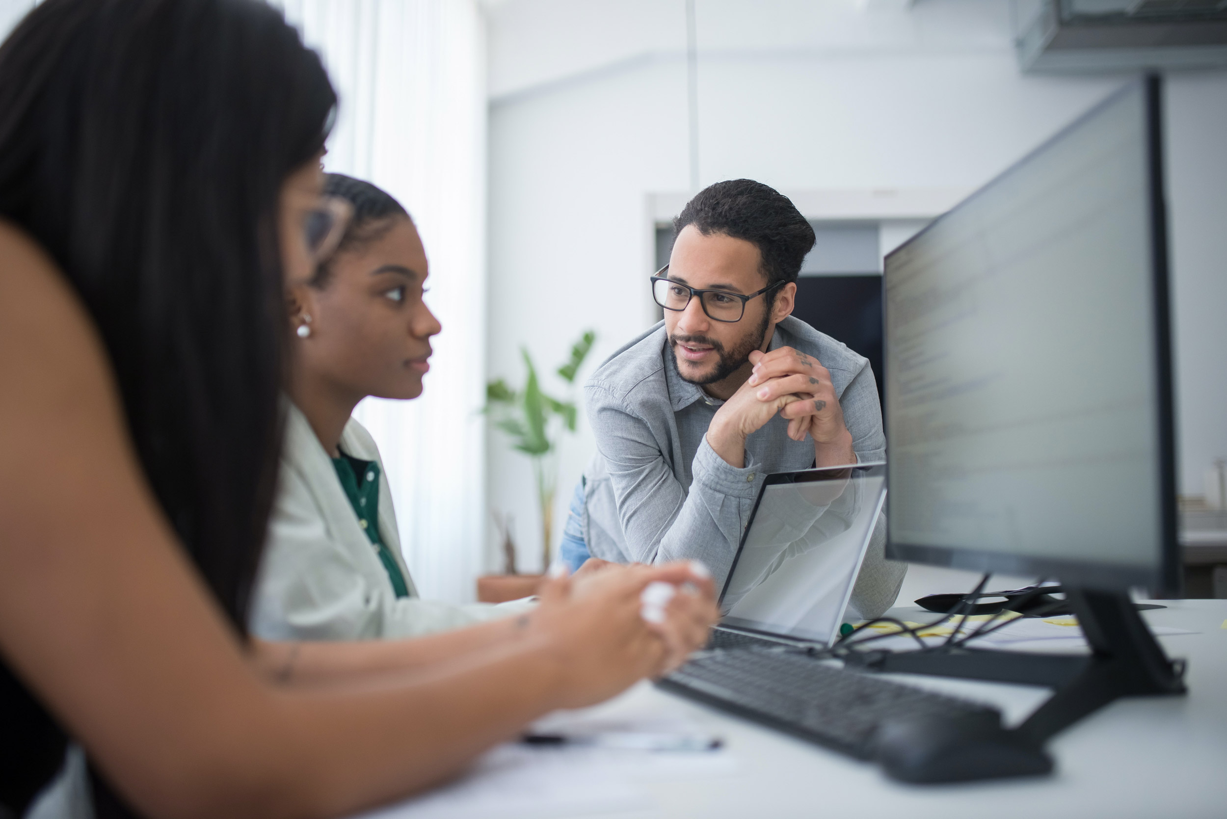AdmiseTax specialists reviewing a client's return on screen