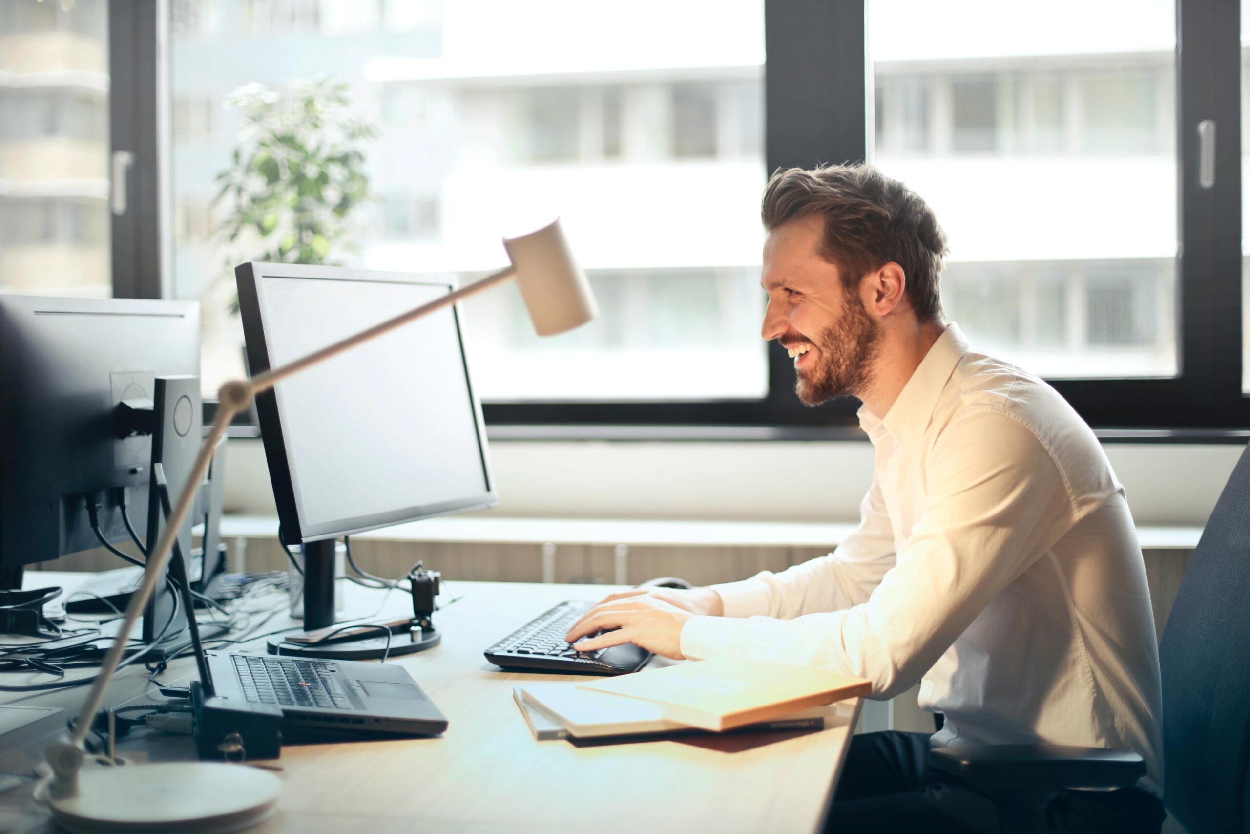 AdmiseTax specialist working at his desk